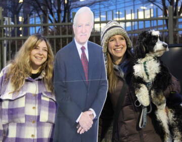 Roughly a dozen people arrived in a Target parking lot across from the 6abc Action News Studio on Dec. 21, 2022 for a tailgate honoring Jim Gardner's last show on the desk. (Cory Sharber/WHYY)