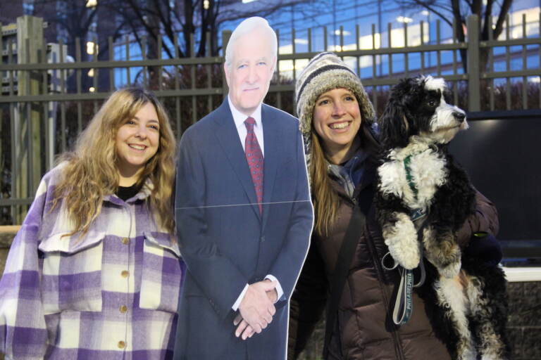 Roughly a dozen people arrived in a Target parking lot across from the 6abc Action News Studio on Dec. 21, 2022 for a tailgate honoring Jim Gardner's last show on the desk. (Cory Sharber/WHYY)