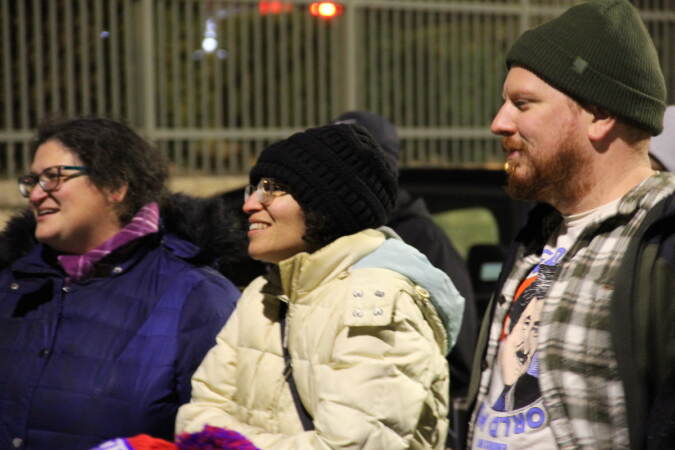 Roughly a dozen people arrived in a Target parking lot across from the 6abc Action News Studio on Dec. 21, 2022 for a tailgate honoring Jim Gardner's last show on the desk. (Cory Sharber/WHYY)