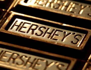 A close-up of a chocolate bar that has the Hershey's name on it.