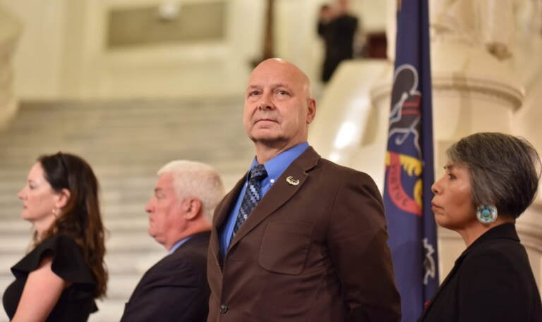 State Sen. Doug Mastriano (R-Franklin), the 2022 Republican candidate for governor, glances into a crowd gathered for a rally celebrating William Penn in the state Capitol rotunda in Harrisburg on July 1, 2022. (Sam Dunklau/WITF)