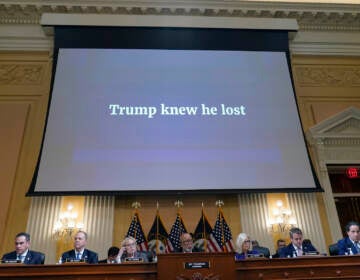 A video presentation plays as the House select committee investigating the Jan. 6 attack on the U.S. Capitol holds its final meeting on Capitol Hill in Washington, Monday, Dec. 19, 2022. (AP Photo/Jacquelyn Martin)