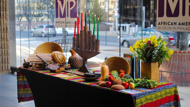 FILE - Kwanzaa table at the African American Museum in Philadelphia