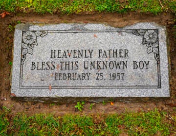 A gravestone reads, 
