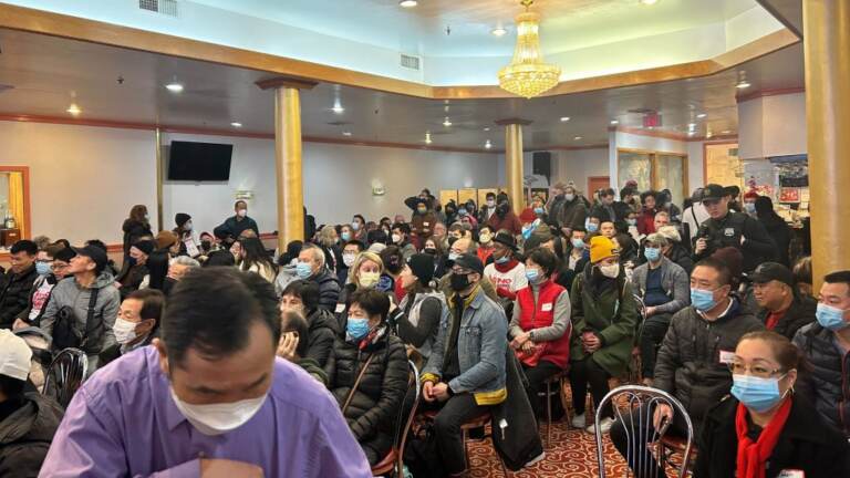 Hundreds pack Ocean Harbor Restaurant for a community meeting over the Sixers' areana proposal