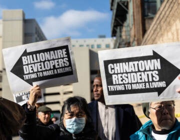 The Chinatown Coalition to Oppose the Arena walked members of the media to the site of the proposed 76ers basketball venue in Philadelphia on January 9, 2023. (Kimberly Paynter/WHYY)