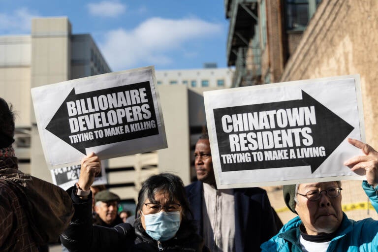 The Chinatown Coalition to Oppose the Arena walked members of the media to the site of the proposed 76ers basketball venue in Philadelphia on January 9, 2023. (Kimberly Paynter/WHYY)