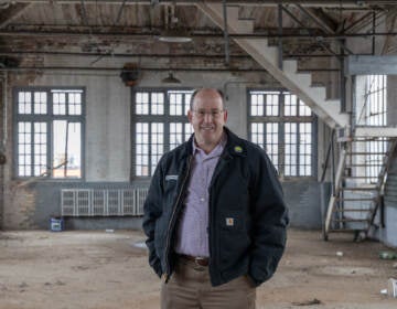 Developer Ken Weinstein inside the former Arguto Oilless Bearing Company and most recently a church building, that he plans to restore and turn into offices. (Kimberly Paynter/WHYY)