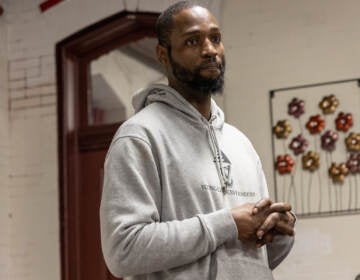 Tyrique Glasgow, Founder of the Young Chances Foundation, lead a meeting to talk about alternatives to Stop and Frisk policing policy at a public meeting in a South Philadelphia Church on January 25, 2023. (Kimberly Paynter/WHYY)