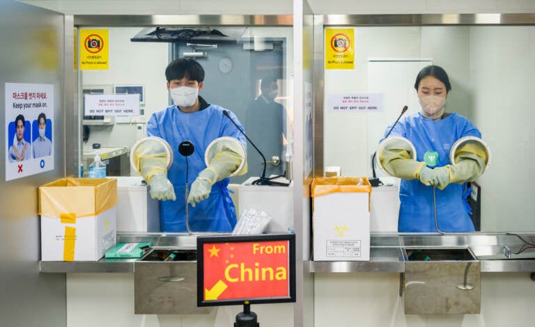 It's COVID testing time at Incheon International Airport, west of Seoul, South Korea. Arrivals from China must now submit to a PCR test. (Kim Jae-Hwan/SOPA Images/Sipa USA)