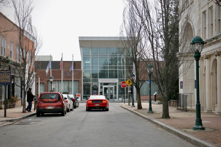 Chester City Hall is visible at the end of a road lined with buildings.