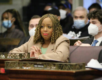 Philadelphia City Councilmember Jamie Gauthier is seated at her council desk.