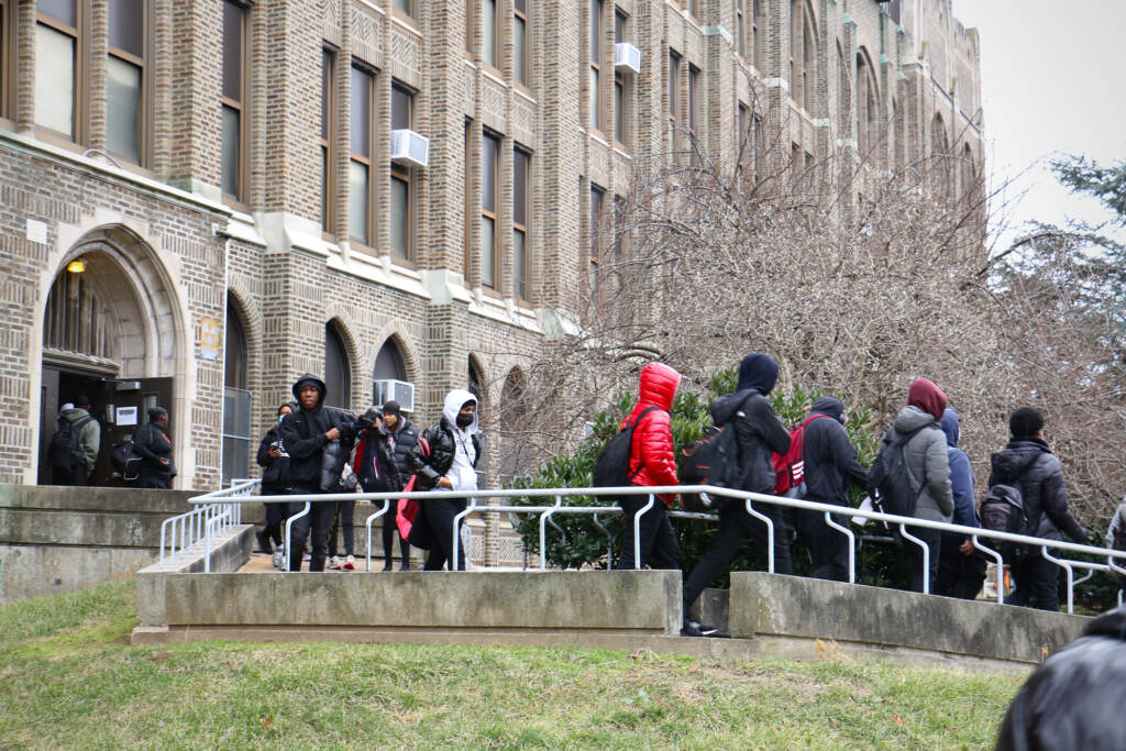 Students walk out of Overbrook High School.