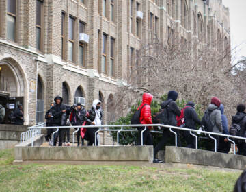 Students walk out of Overbrook High School.