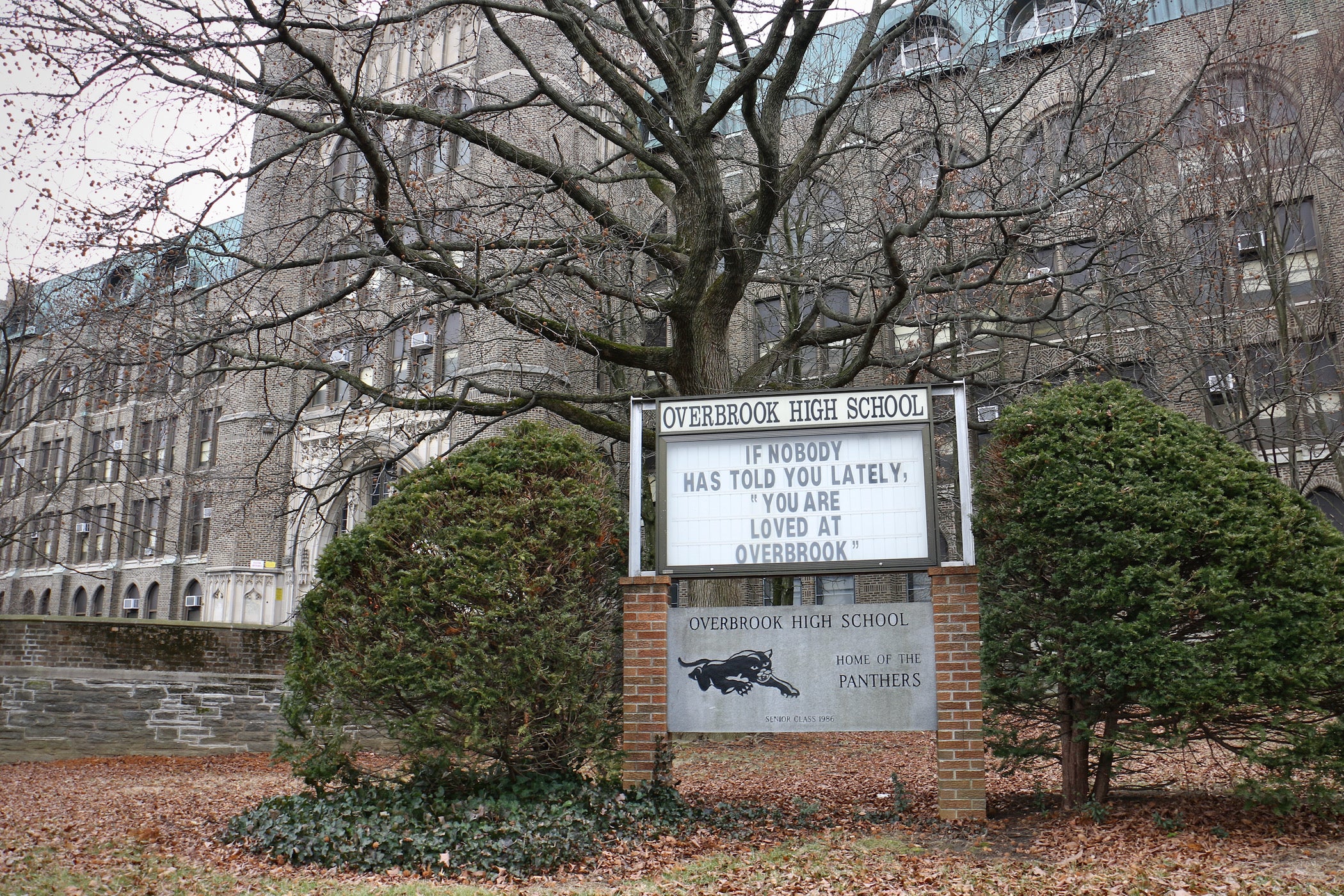 A sign outside of a building reads Overbrook High School.