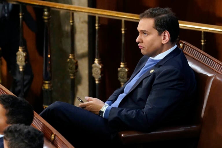 Rep.-elect George Santos, R-N.Y. sits in the chamber during opening day of the 118th Congress at the U.S. Capitol, Tuesday, Jan 3, 2023, in Washington. (AP Photo/Andrew Harnik)