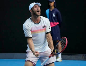Tommy Paul of the U.S. celebrates after defeating compatriot Ben Shelton in their quarterfinal match at the Australian Open