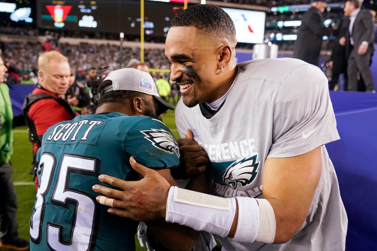 Philadelphia Eagles running back Boston Scott (35) and quarterback Jalen Hurts celebrate after the NFC Championship NFL football game between the Philadelphia Eagles and the San Francisco 49ers