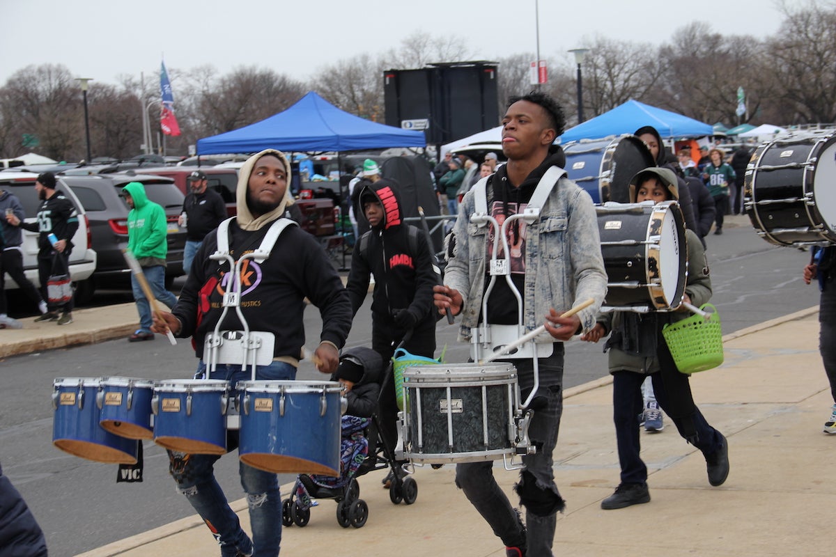 A drumline performs during the tailgate outside Lincoln Financial Field ahead of the NFC Championship game