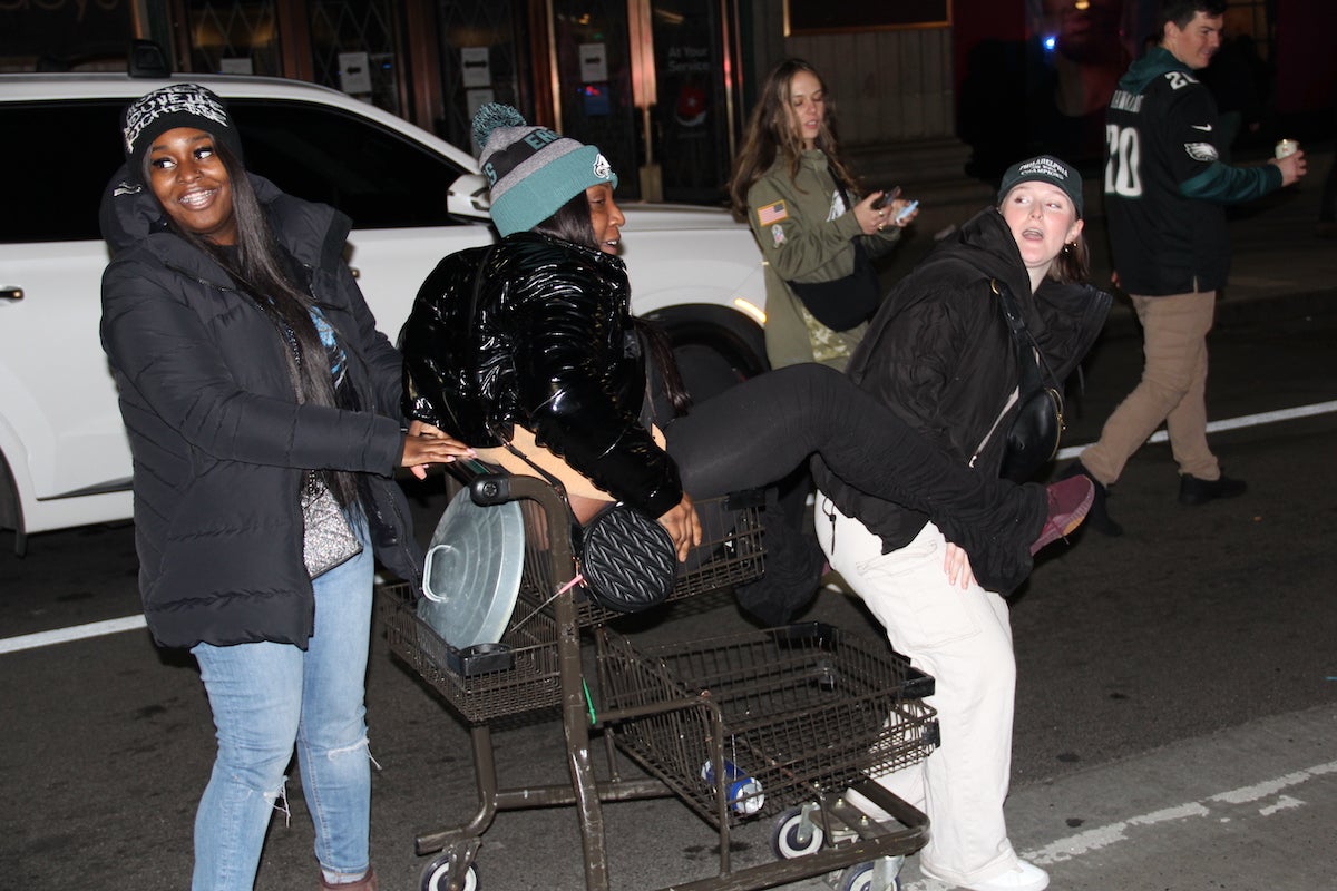 Eagles fans rode a shopping cart through the streets of Center City