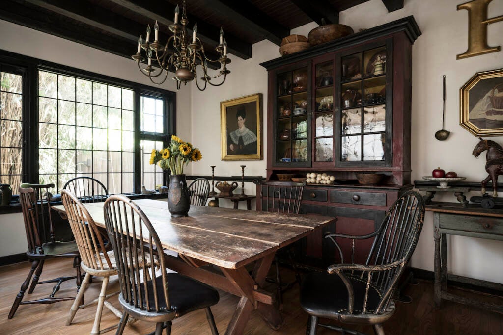 Some of the 70 antique Windsor chairs from the collection of Philadelphia illustrator Charles Santore and his wife Olenka