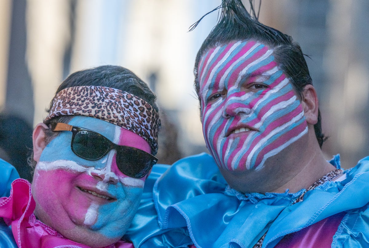 Joe Fox, left and Kevin Werner pose with painted faces. The pair are members of Cara Lion Wench Brigade.(Jonathan Wilson for WHYY)