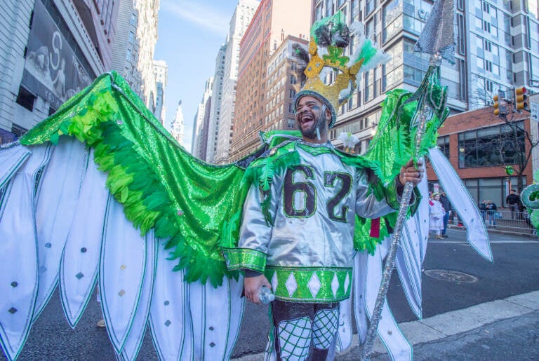 Brian Creamer with an Eagles' Jason Kelce Jjersey greets the crowds on South Broad St. (Jonathan Wilson for WHY)