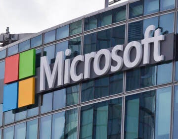 Microsoft said it plans to cut 10,000 jobs, or about 5% of its workforce, in the first months of 2023. (Michel Euler/AP)