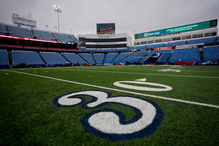 The 30-yard line at Highmark Stadium in Buffalo bears a stylized number 3 in support of Buffalo Bills safety Damar Hamlin.