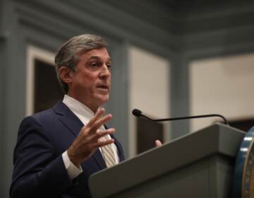 An upclose shot of Gov. John Carney speaking at a podium.