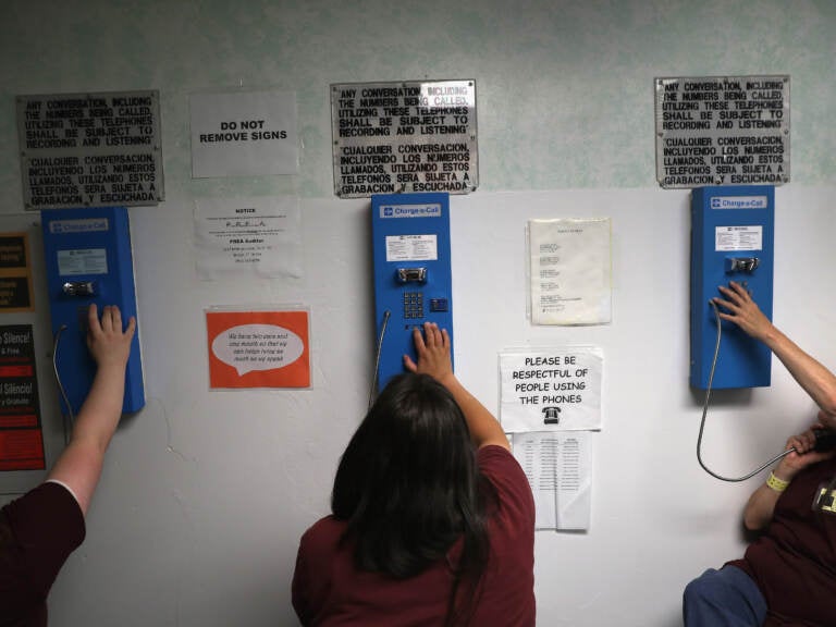 Prison inmates make one of their daily allotment of six phone calls at the York Community Reintegration Center. (John Moore/Getty Images)