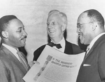 Rev. Martin Luther King Jr., left, receives the National Fellowship Award in 1957 in Philadelphia.