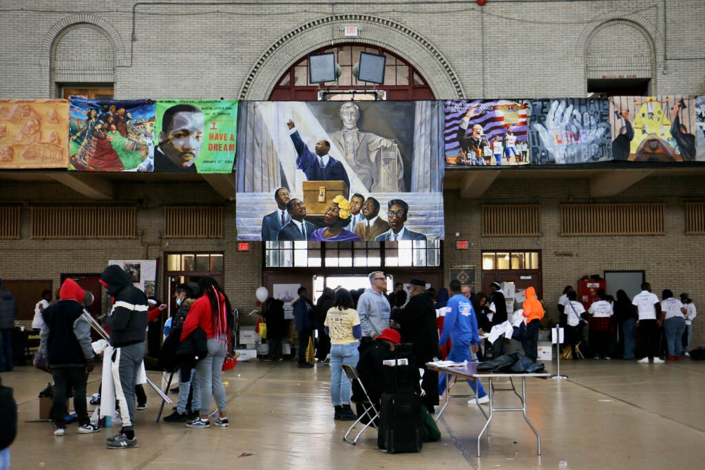 Volunteers are seen at tables set up for Girard College's MLK Day of Service
