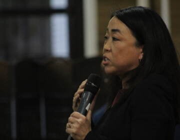 Helen Gym speaks at a mayoral candidate forum