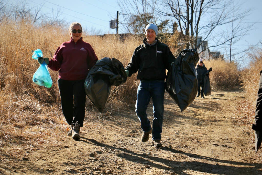 Volunteers collect trash and bottles at Tacony Creek Park