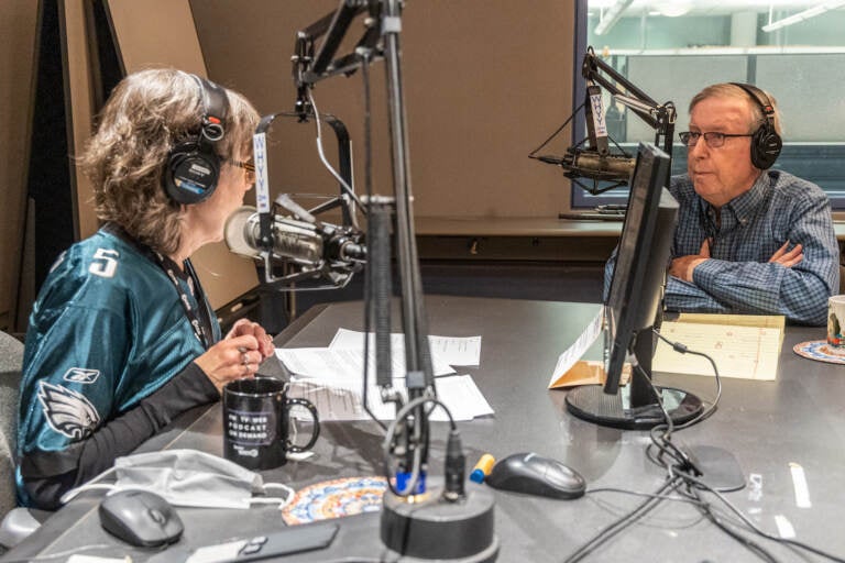 WHYY’s Mary Cummings-Jordan talks with sports commentator Ray Didinger about Super Bowl LVII at WHYY studios in Philadelphia. (Kimberly Paynter/WHYY)