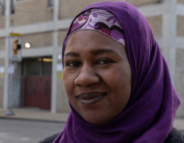 Haajar Abdullah-Aziz outside Robert Morris Elementary School in Philadelphia. (Kimberly Paynter/WHYY)