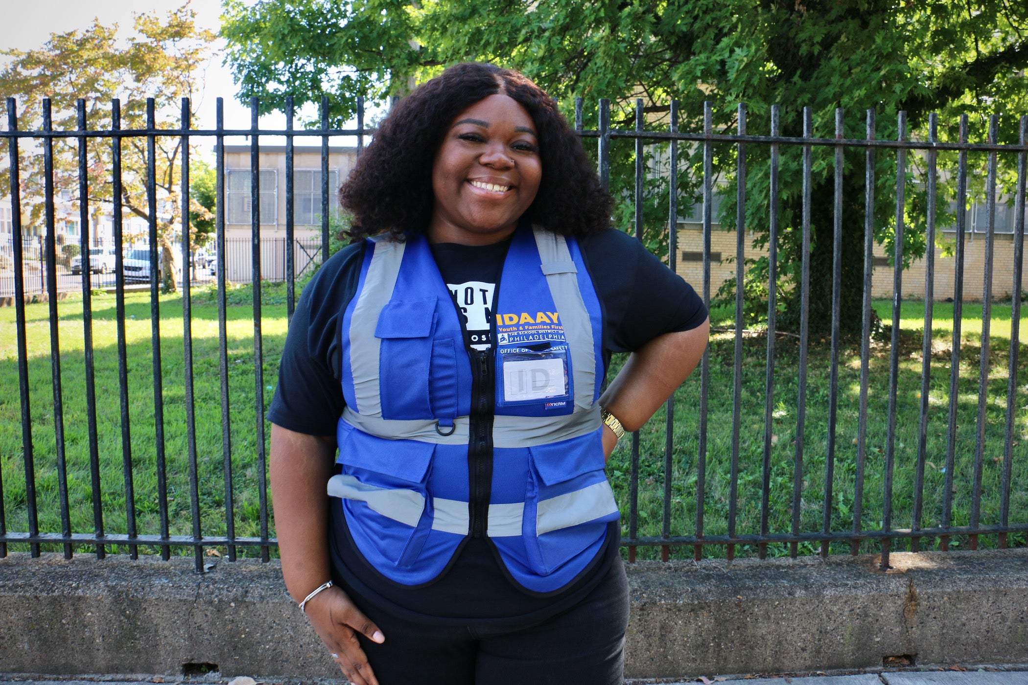 Jay Dacres poses for a photo in a safety vest.