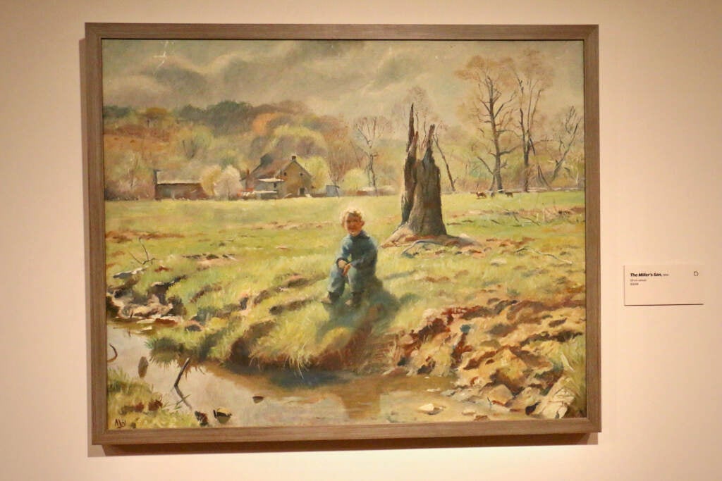 A painting shows a person seated by a stream.
