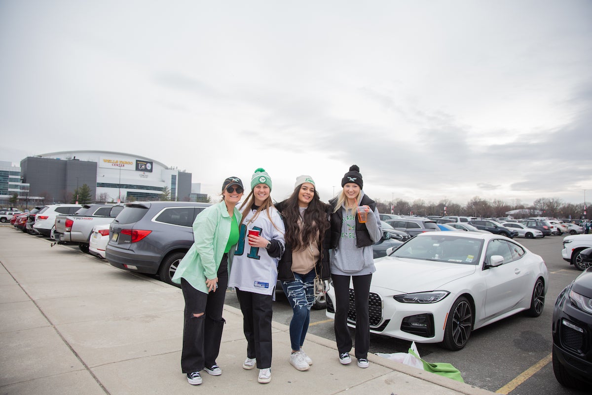 (from left) Choley McFadden, Hannah Maggio, Athena Chaikalis, and Jess Luongo get their day started outside of Xfinity Live! before heading inside for the party hosted by ''Jersey Shore'' legend Pauly D. (Emily Cohen for WHYY)