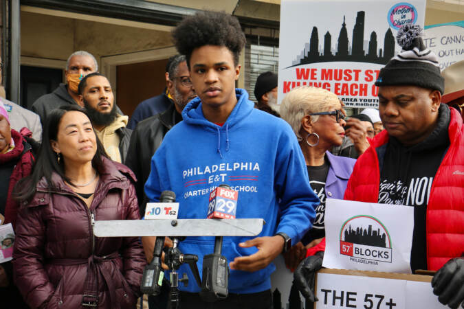 Malik Diggins, 16, talks about strategies to get more young people involved in the fight against gun violence during a press conference held by the 57 Blocks coalition in North Philadelphia. (Emma Lee/WHYY)