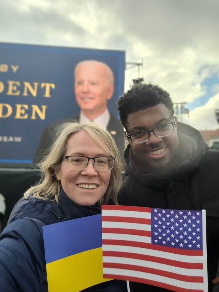 Tatiana Poladko and Atnre Alleyne waited outside for four hours to watch President Biden, a fellow Delawarean, speak in Warsaw