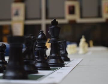 Chess pawns ready to meet their players at the Wild Card match (Ella Lathan/WHYY)