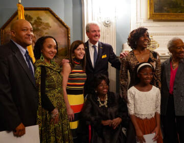 A group of people pose for a photo.