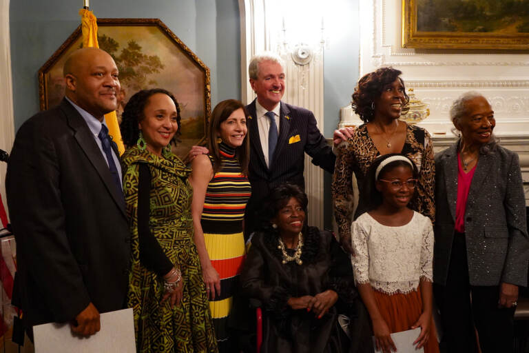 A group of people pose for a photo.