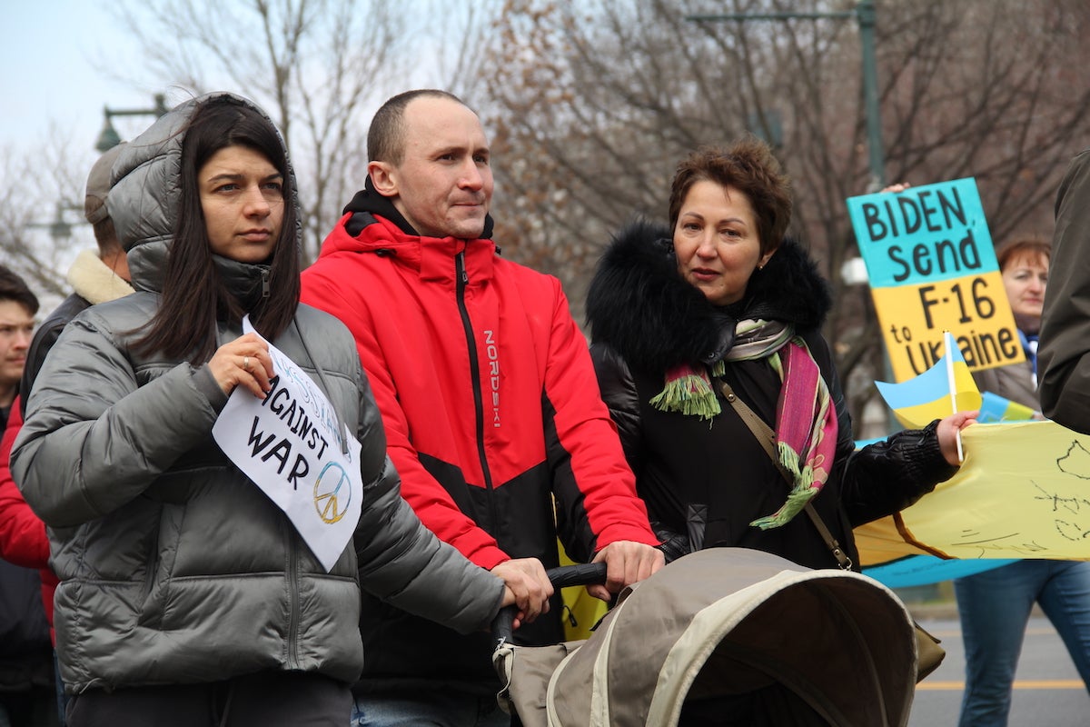 Viacheslav Timoshenko (center) and his wife Ekaterina (left) sought asylum from Russia after the war started citing their disagreement with the government's actions as their main reason for leaving