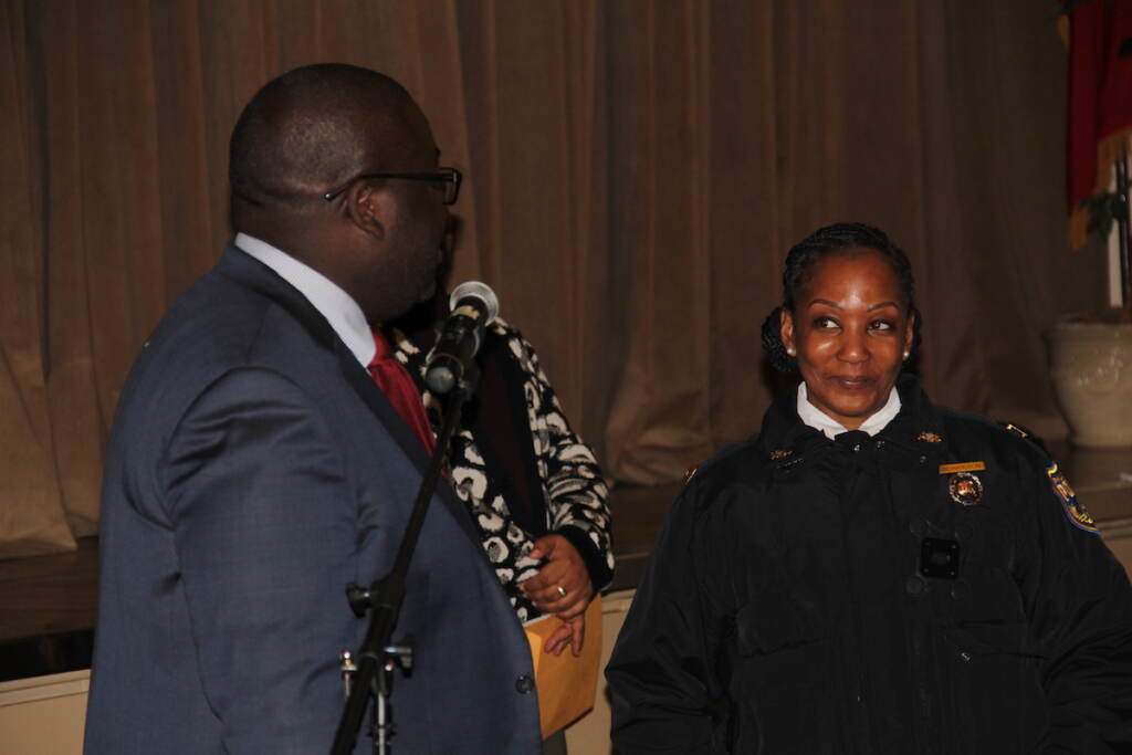 Councilmember Anthony Phillips (left) welcomed Philadelphia Police Capt. Tanisha Richardson (right) to address community members at the Masjidullah Center for Human Excellence regarding vandalism that occurred over the weekend