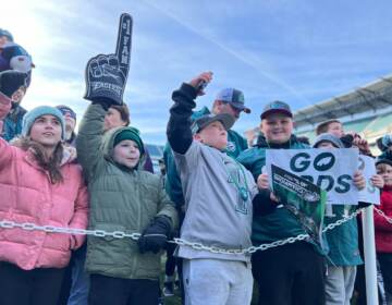Eagles fans get fired up during the Eagles Super Bowl Send-off Party as they await the arrival of players and coaches