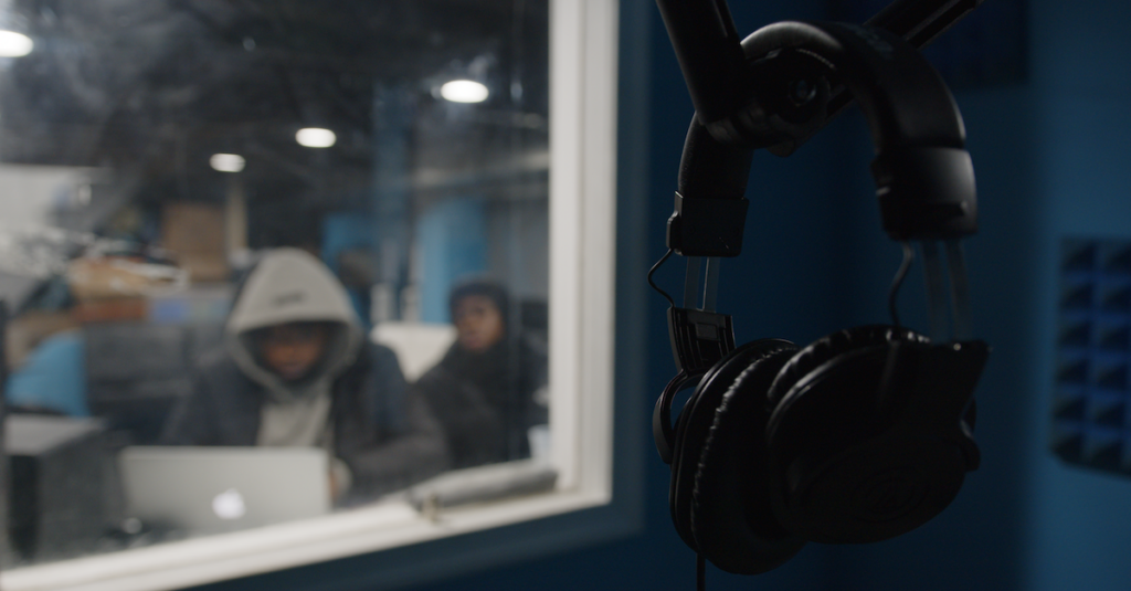 DaShaun Hardin (right) and Kahier Myrick (left) sitting outside of YEAH Philly’s music recording studio