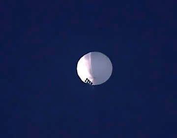 An image of a spy balloon in the sky